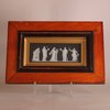 W817 A framed Wedgwood jasperware muses plaque, 19th century