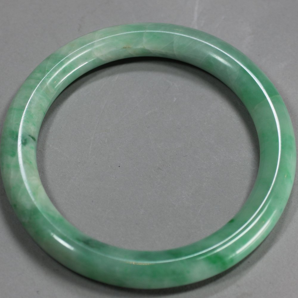 A2595 Jadeite bangle, 19th century, diameter: 3 1/2in. 8.9cm.  