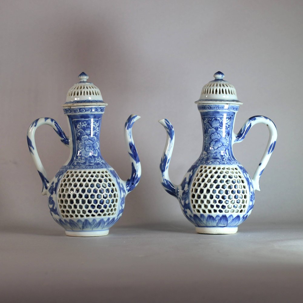 AA15 A pair of blue and white double-walled reticulated ewers