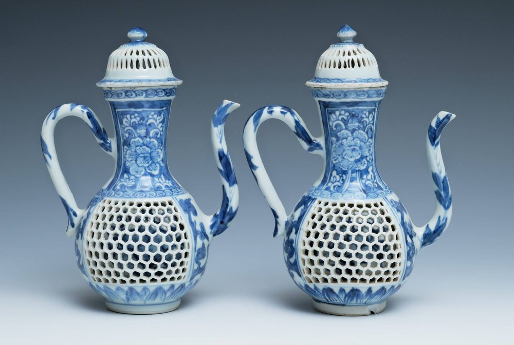 AA15 A pair of blue and white double-walled reticulated ewers