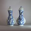 AA16 A pair of blue and white double-walled reticulated ewers and covers of slender form, Kangxi(1662-1722)