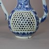 AA16 A pair of blue and white double-walled reticulated ewers and covers of slender form, Kangxi(1662-1722)
