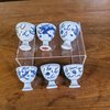 AA59 Six blue and white porcelain stem cups, circa 1643, each painted with a dragon chasing a flaming pearl.circa 1643