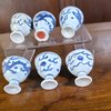 AA59 Six blue and white porcelain stem cups, circa 1643, each painted with a dragon chasing a flaming pearl.circa 1643