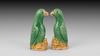 AA85 A pair of small Chinese export green and yellow glazed parrots, 18th Century, 10cm high   Provenance: Jorge Welsh