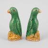 AA85 A pair of small Chinese export green and yellow glazed parrots, 18th Century, 10cm high   Provenance: Jorge Welsh