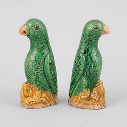 A pair of small Chinese export green and yellow glazed parrots, 18th Century,