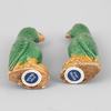 AA85 A pair of small Chinese export green and yellow glazed parrots, 18th Century, 10cm high   Provenance: Jorge Welsh