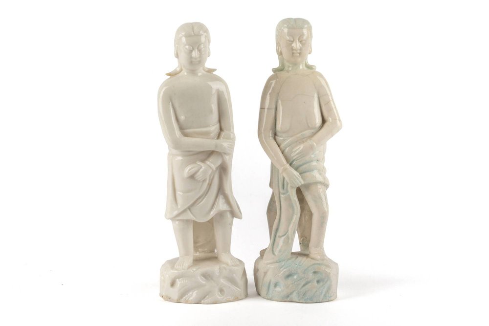 AA77 A PAIR OF CHINESE BLANC DE CHINE DEHUA PORCELAIN FIGURES OF `ADAM AND EVE'  Kangxi
