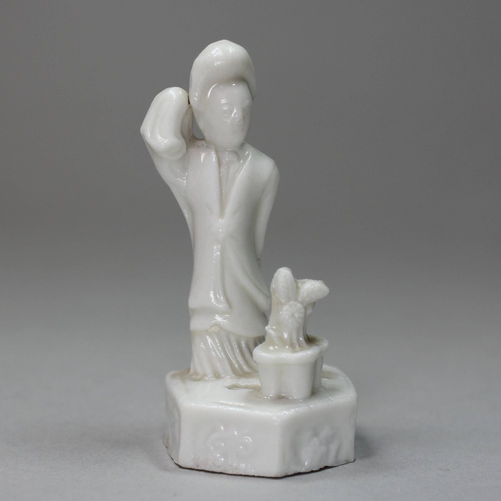 E712 Miniature Chinese blanc-de-chine figure of a noblewomen