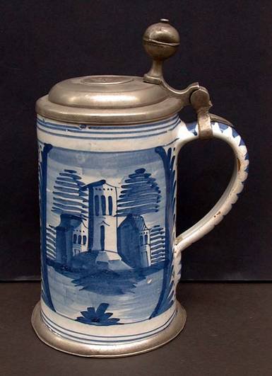 F452 German blue and white faience tankard