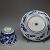 F952 Blue and white moulded teabowl and saucer