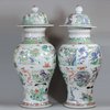 JB60 Matched pair of famille verte baluster vases and covers