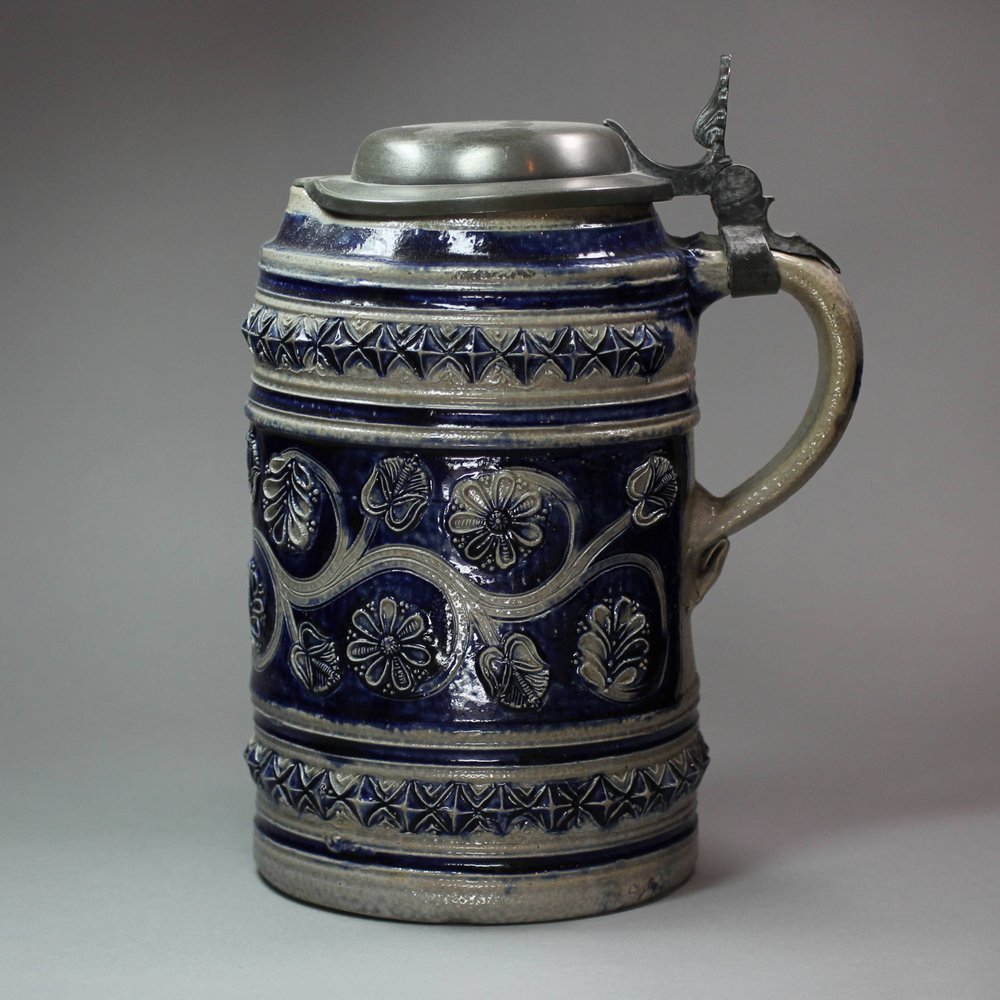 L399 German stoneware tankard with pouring lip and  flat pewter cover