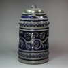 L399 German stoneware tankard with pouring lip and  flat pewter cover