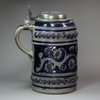 L399 German stoneware tankard with pouring lip and  flat pewter cover