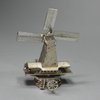 L404 Dutch silver-metal miniature of a windmill with moveable sails