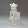 L427 Blanc-de-chine dog of Fo joss stick holder on a square base