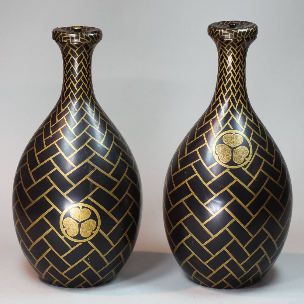 N685 Pair of Japanese lacquer sake-flasks and covers