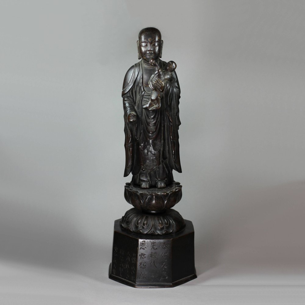 P233 Rare Japanese bronze group of Buddha holding a child holding