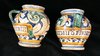 P475 A pair of Italian maiolica polychrome single-handled drug jars