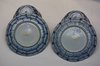 Q147 Pair of Chinese blue and white moulded bowls and saucers