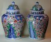 Q858 Pair of Chinese Wucai baluster vases and covers