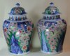 Q858 Pair of Chinese Wucai baluster vases and covers