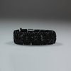 Q895 Jet bracelet, with faceted jet panels on elastic strand