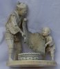 R421 Japanese ivory carving of a farmer and a boy loading a basket