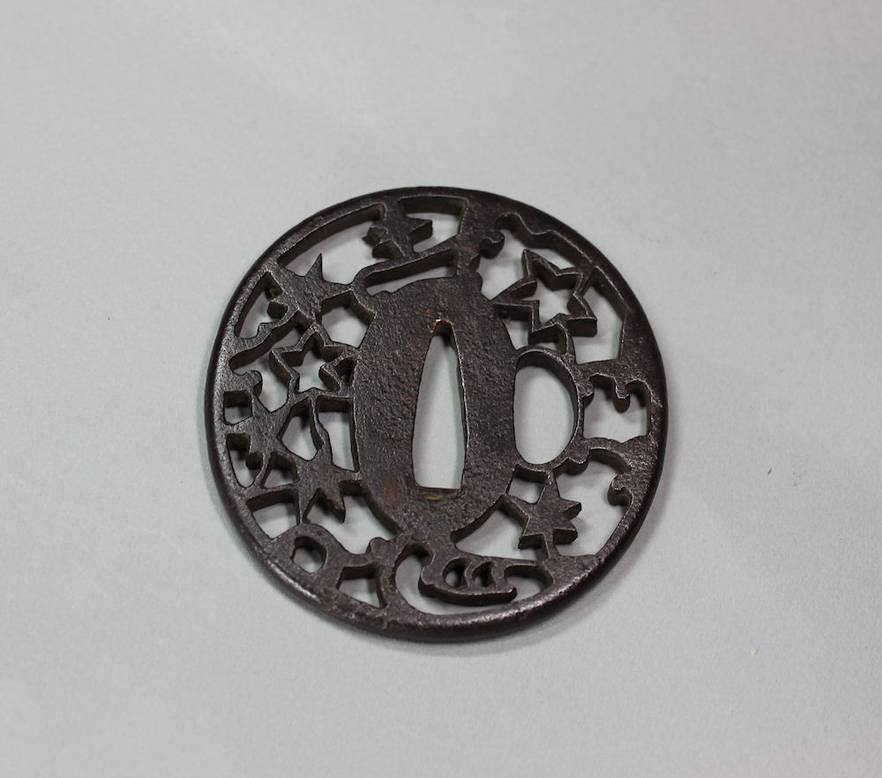 R753 Japanese iron Sukashi Tsuba (sword guard), of circular form