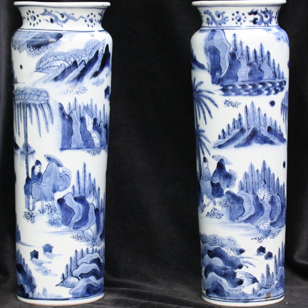 R838 Pair of Japanese blue and white 'rollwagon' vases, 1660-80 