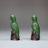 U219 Pair of miniature famille verte biscuit parrots
