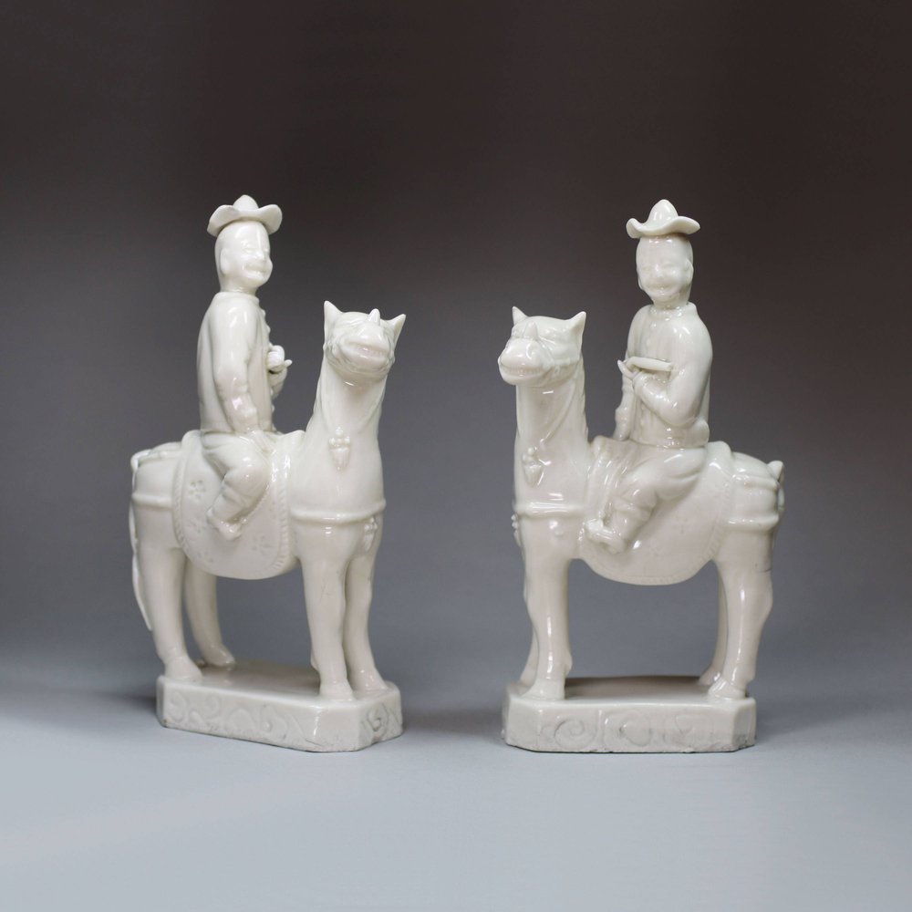 U350 Pair of Chinese blanc de chine equestrian figures