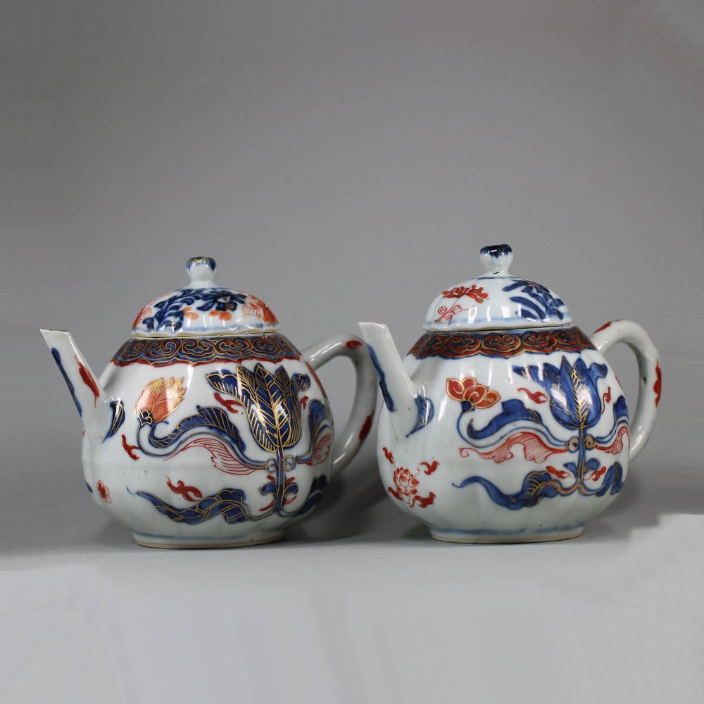 U452 Pair of Chinese imari ribbed teapots and covers