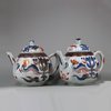 U452 Pair of Chinese imari ribbed teapots and covers