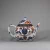 U452 Pair of Chinese imari ribbed teapots and covers