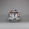 U452 Pair of Chinese imari ribbed teapots and covers