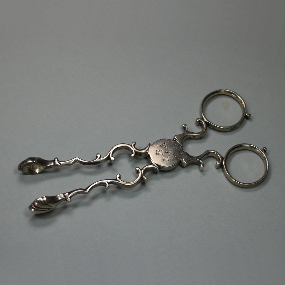 U65 Pair of Georgian silver tongs, c. 1750