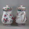 U768 Pair of large famille rose jugs and covers