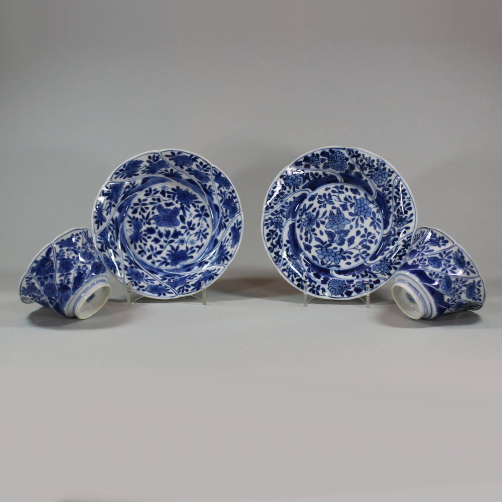 U867 Pair of Chinese blue and white moulded teabowls and saucers