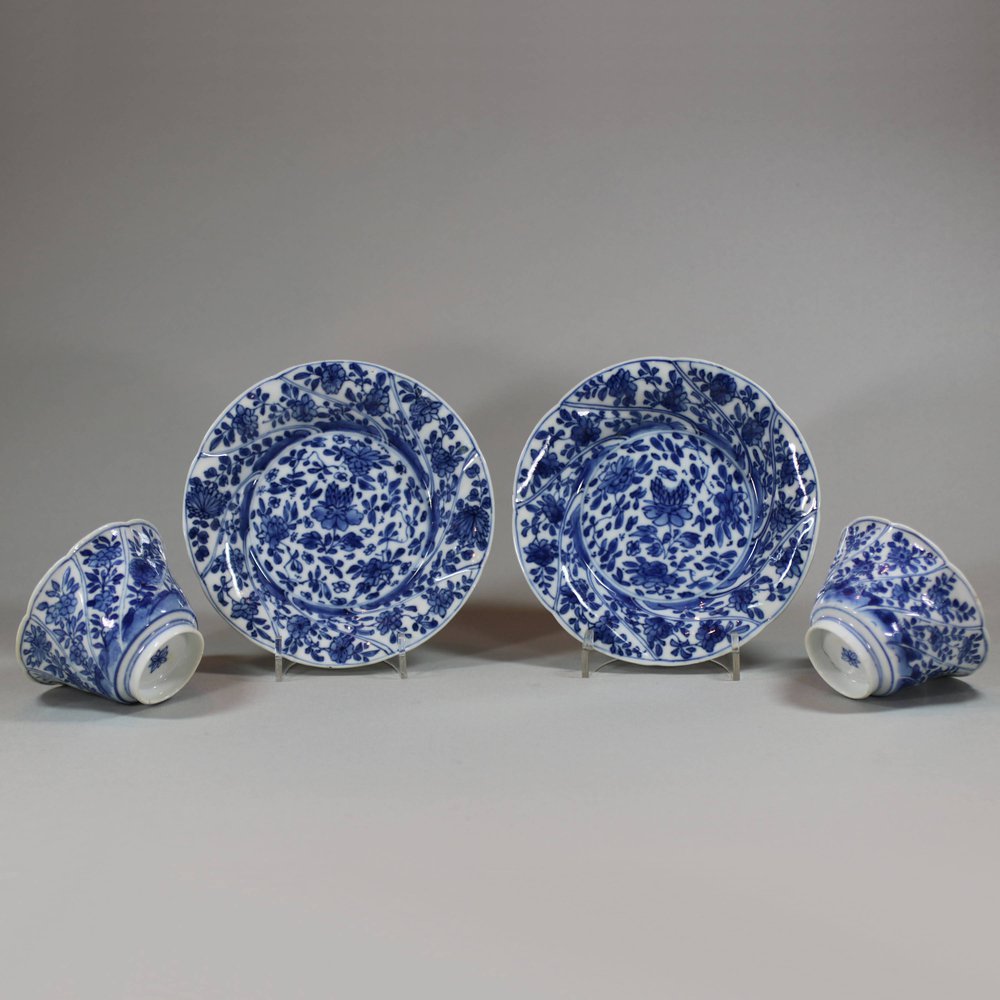 U868 Pair of Chinese blue and white moulded teabowls and saucers