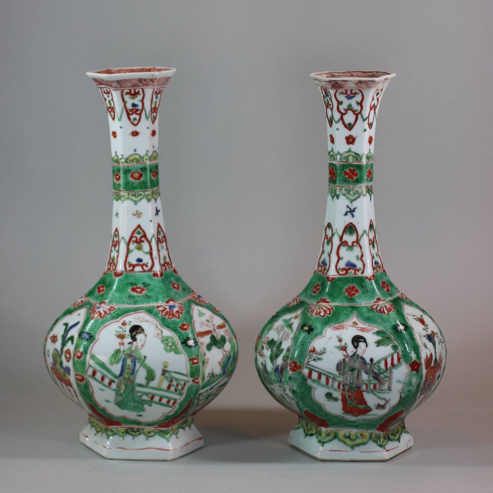 U933 Pair of famille verte facetted bottle vases