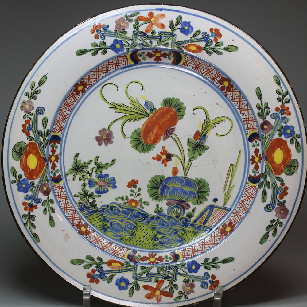 V235A Faenza faience plate, decorated in the Chinese style in blue