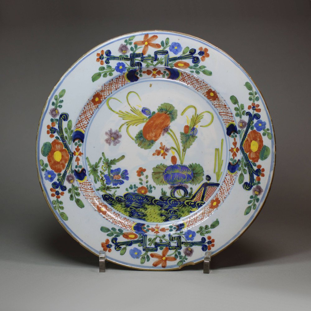 V235B Faenza faience plate, decorated in the Chinese style in blue