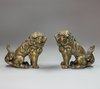 V251 Pair of Chinese bronze Buddhist lion scroll weights