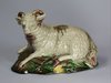 V687 English Staffordshire Burslem figure of a recumbent ram