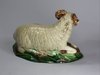 V687 English Staffordshire Burslem figure of a recumbent ram