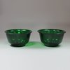 V964 Pair of green Chinese Peking glass bowls, diameter: 4 1/2in.