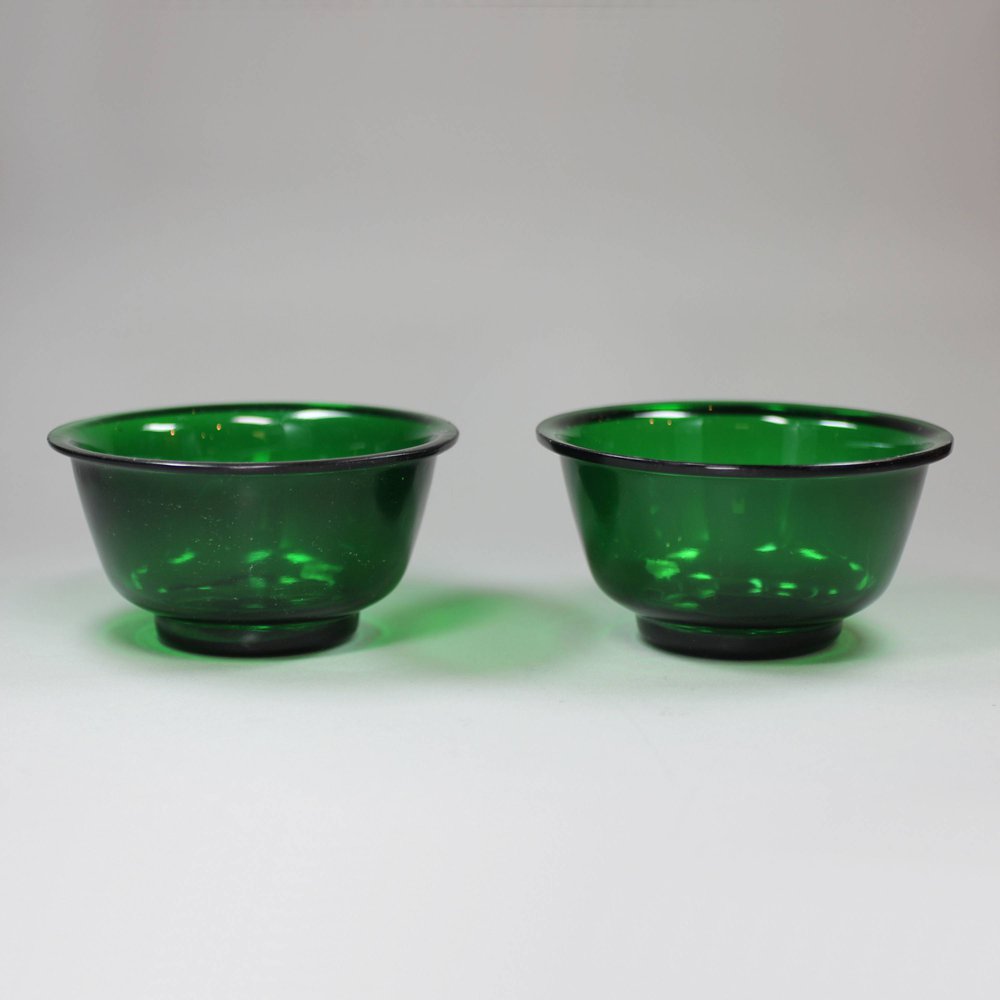 V966 Pair of green Chinese Peking glass bowls, diameter: 4 1/2in.